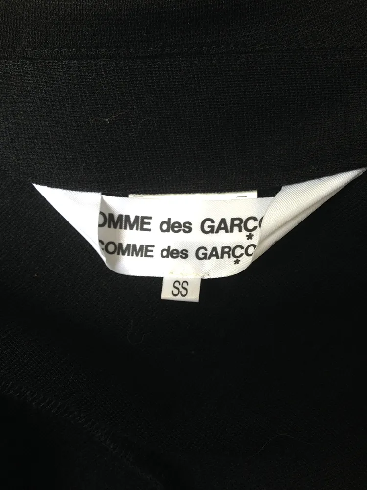 Comme des Garçons black twisted jacket — AD 2006