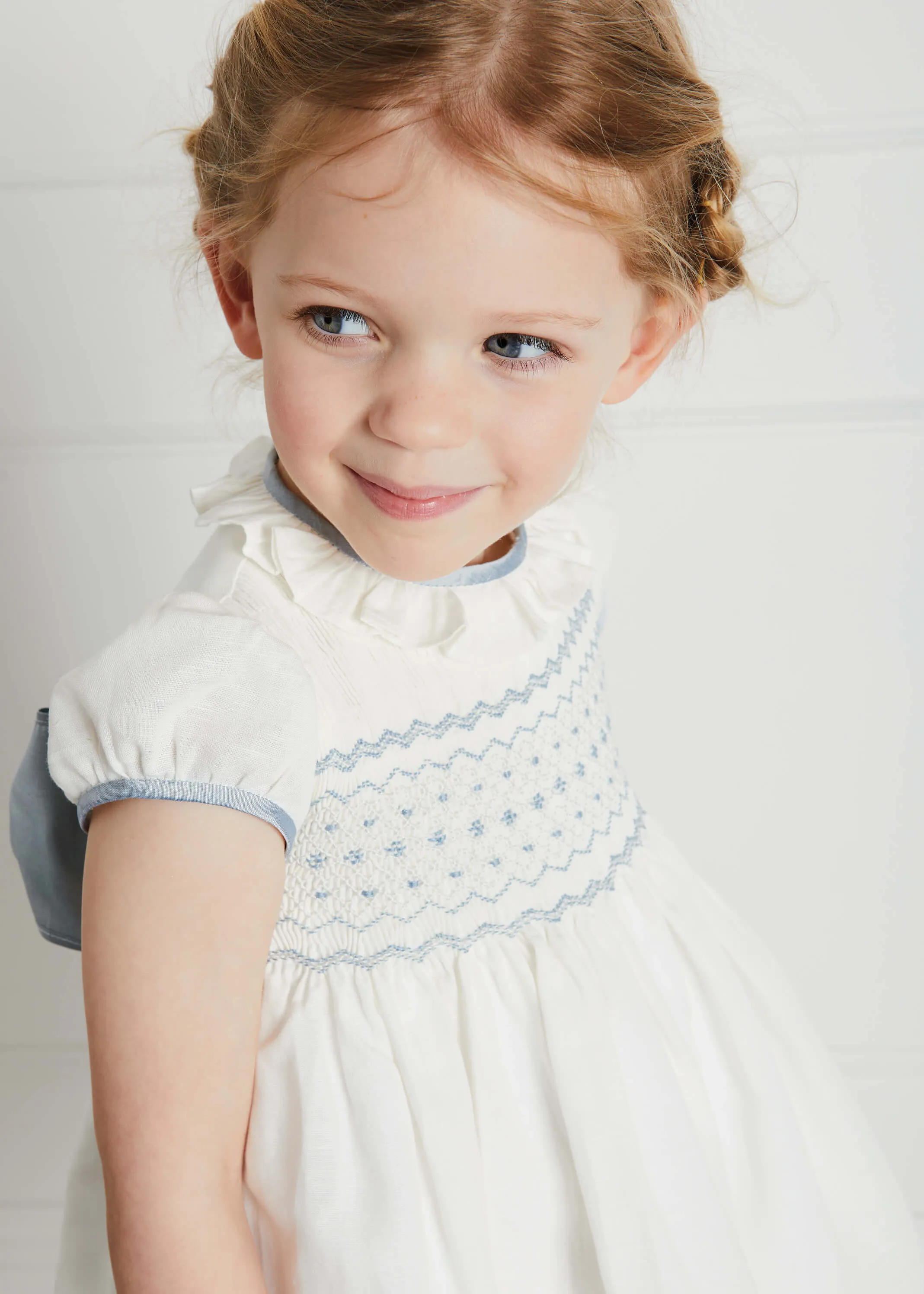 Ivory Handsmocked Occasion Dress with Blue Details (12mths-8yrs)